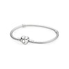 Close-up of Pandora Moments Sterling Silver Snake Chain Bangle featuring a heart-shaped clasp
