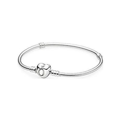 Close-up of Pandora Moments Sterling Silver Snake Chain Bangle featuring a heart-shaped clasp