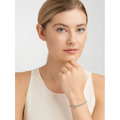 women wearing Forever Facets Diamond Accent Tennis Bracelet