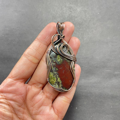 Dragon Blood Jasper Copper Wire Wrapped Pendant
